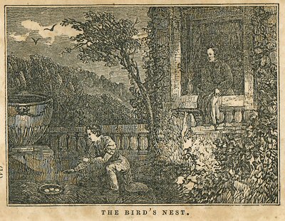 a man watches a boy with a bird's nest