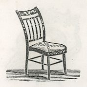 a chair with a painted back and rush seat