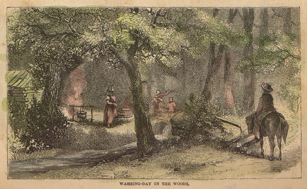 A woman scrubs under the trees
