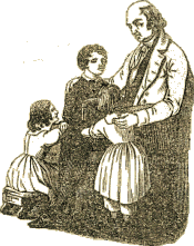 Robert Merry sits inside, talking with three white children