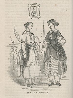 two young women wearing loose trousers under long skirts