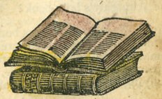 a book lies open on a closed bible