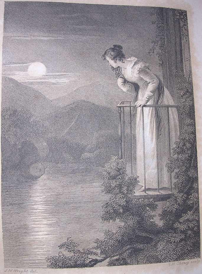 a young white woman on a balcony looks down into a moonlit lake